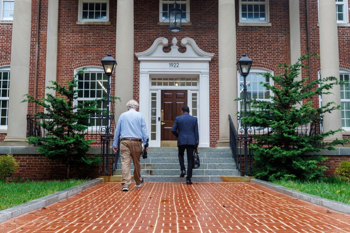 Provost Chris Bracey walks into 1922 F Street in September.