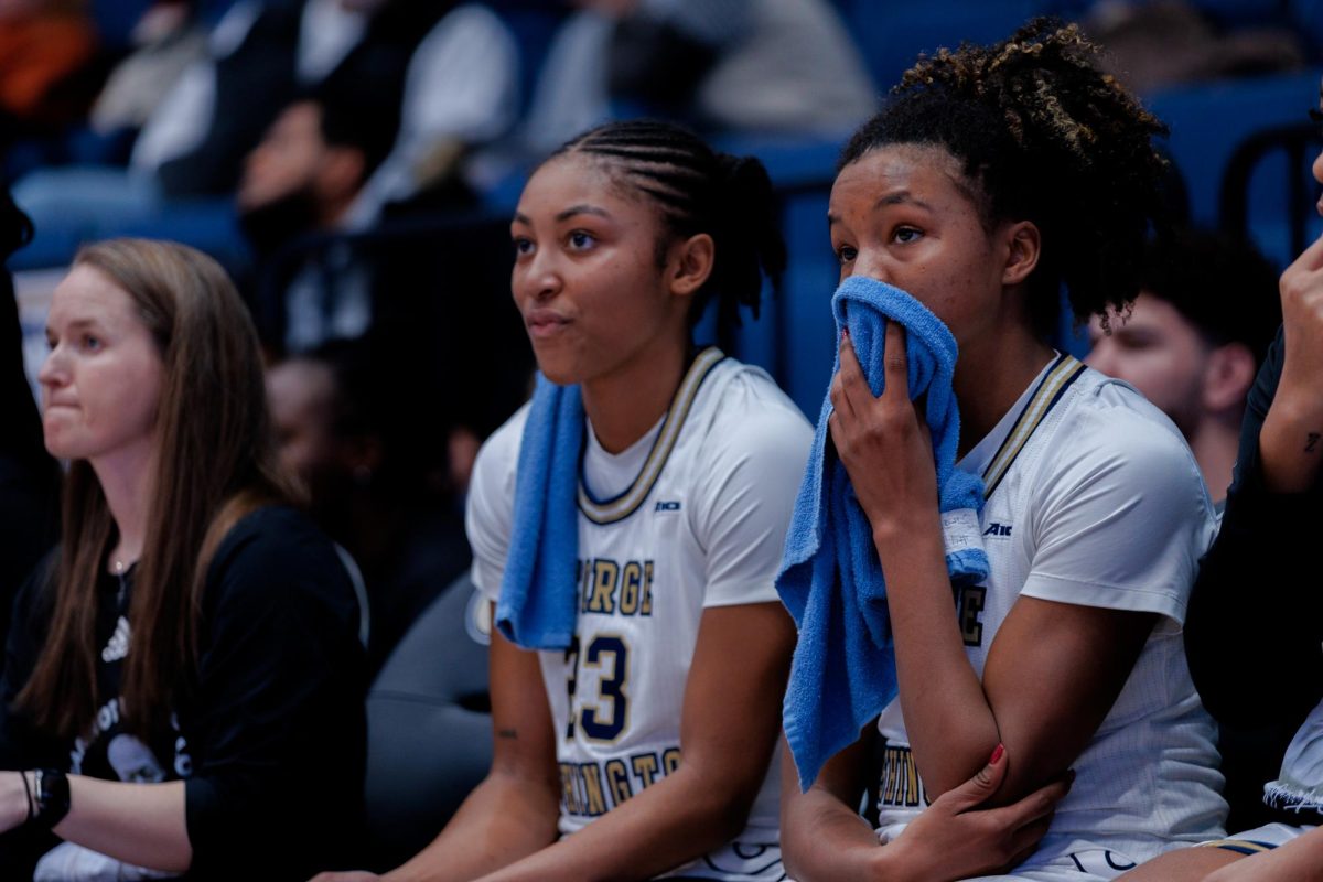Graduate guard Makayla Andrews and sophomore forward Sara Lewis react from the team benches during yesterdays game against VCU.