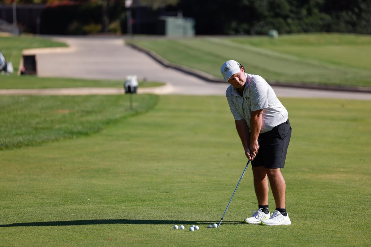 Junior golfer Manuel Barbachano swings during a practice in November.